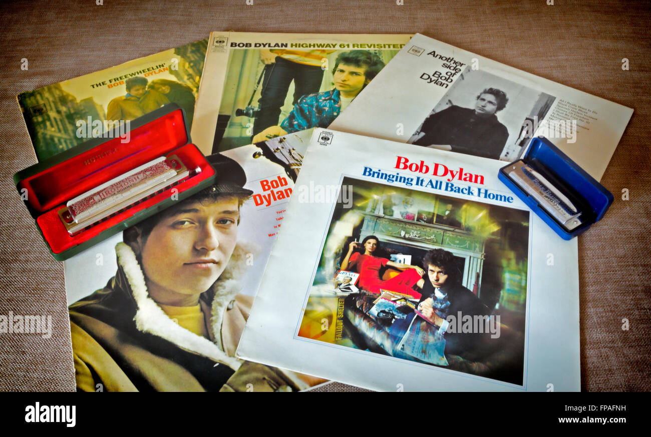 Bob dylan record albums and harmonicas nostalgia Stock Photo