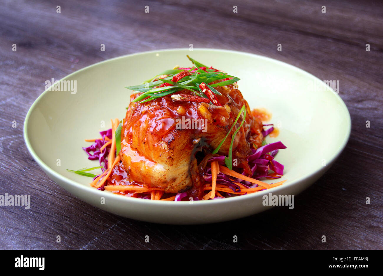 Fried fish with hot chili sauce Stock Photo