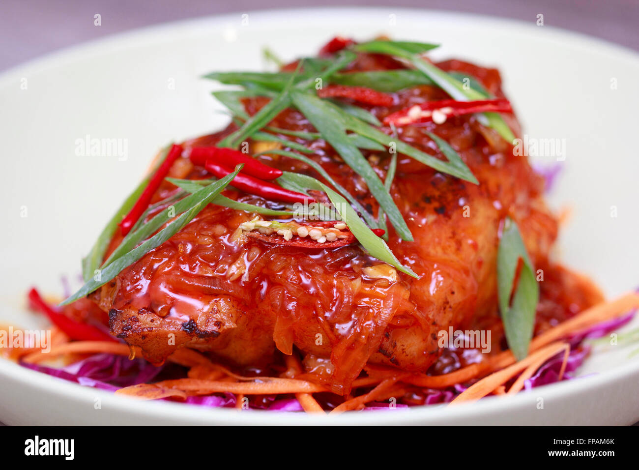 Fried fish with hot chili sauce Stock Photo