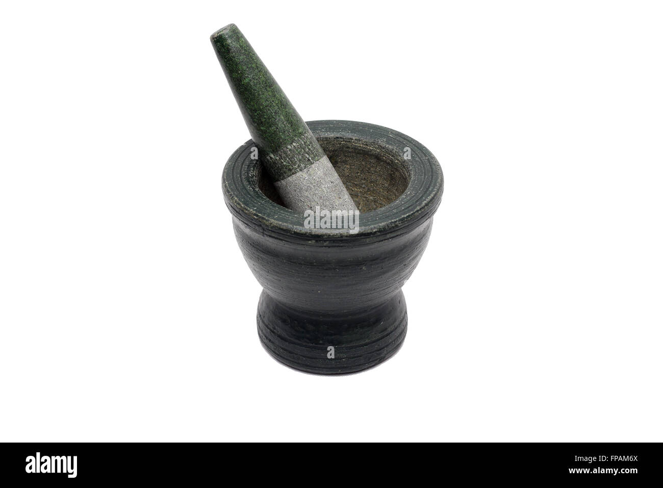 Granite mortar and pestle. Isolated on white background Stock Photo