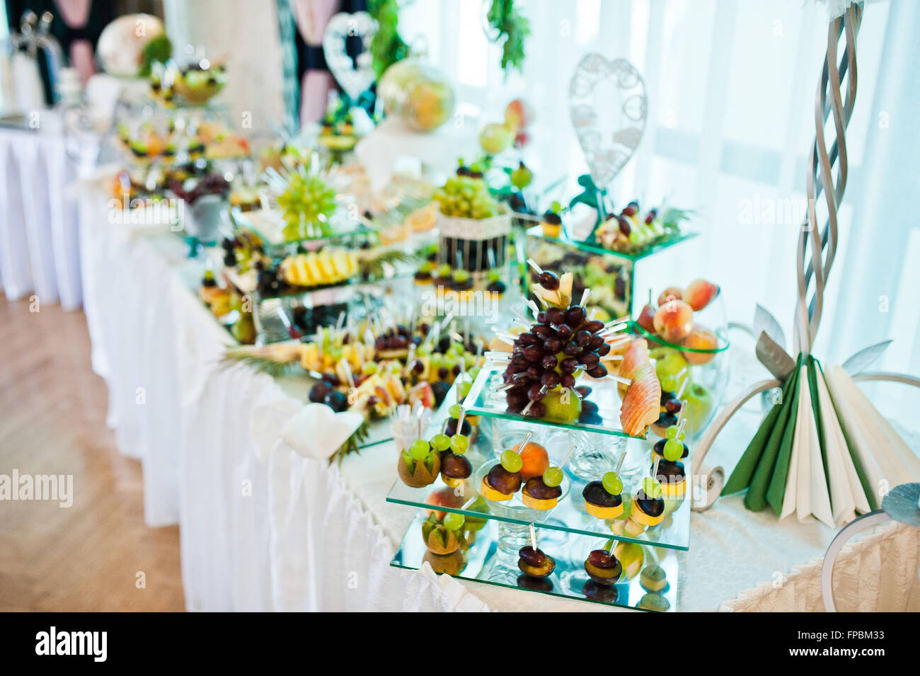 Wedding reception, table of fruits Stock Photo - Alamy