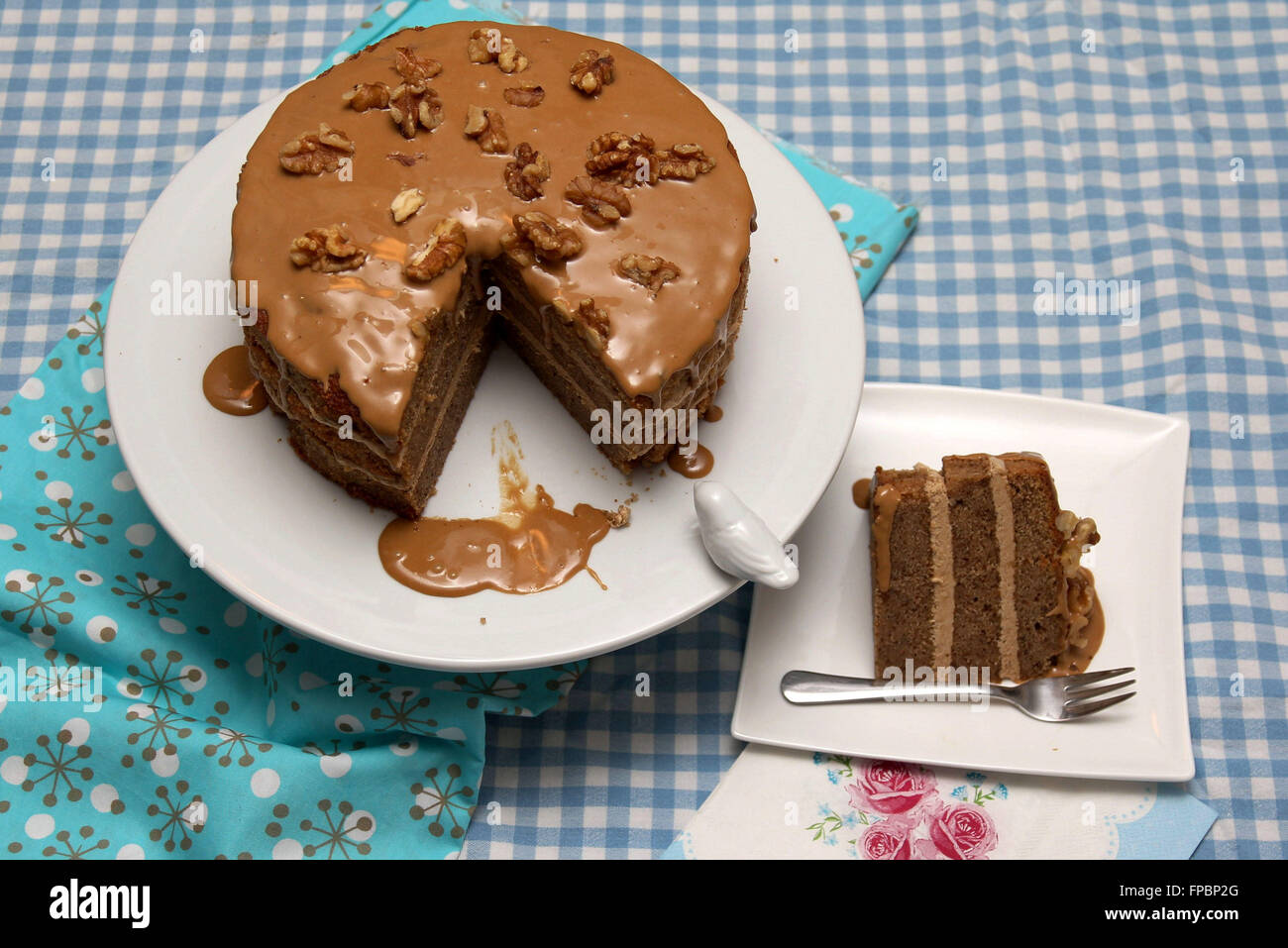 Coffee Walnut Layer Cake on the table Stock Photo
