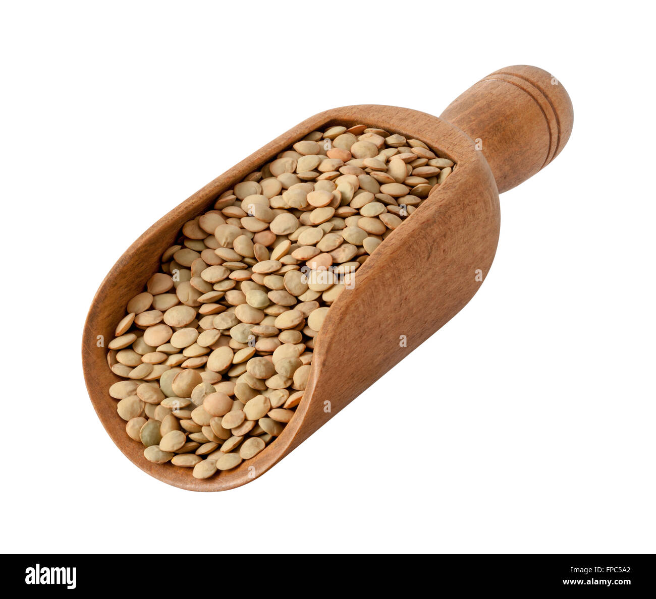 Lentils in a Wood Scoop. Full focus from front to  back. The image is a cut out, isolated on a white background. Stock Photo