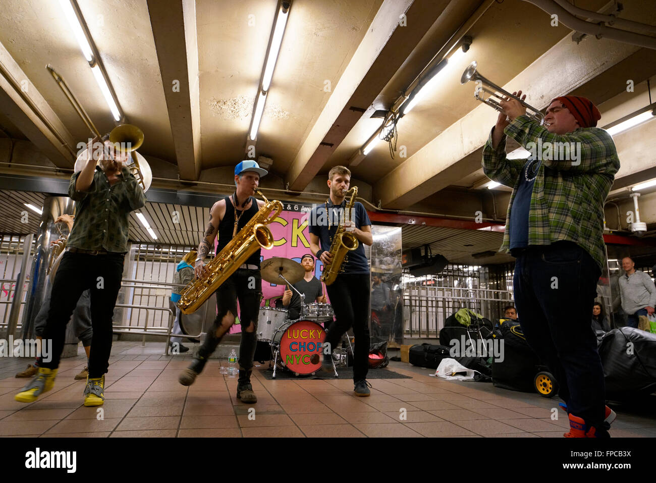 A brass band performing in 34th street Herald Square subway station