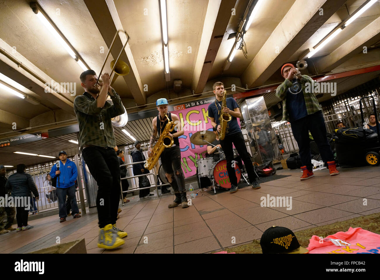 A brass band performing in 34th street Herald Square subway station