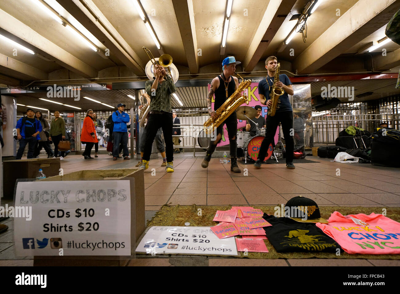 A brass band performing in 34th street Herald Square subway station