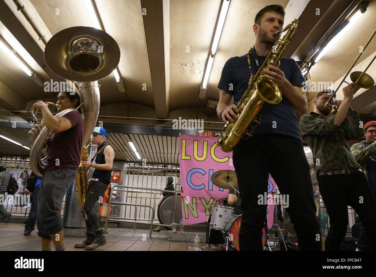 A brass band performing in 34th street Herald Square subway station