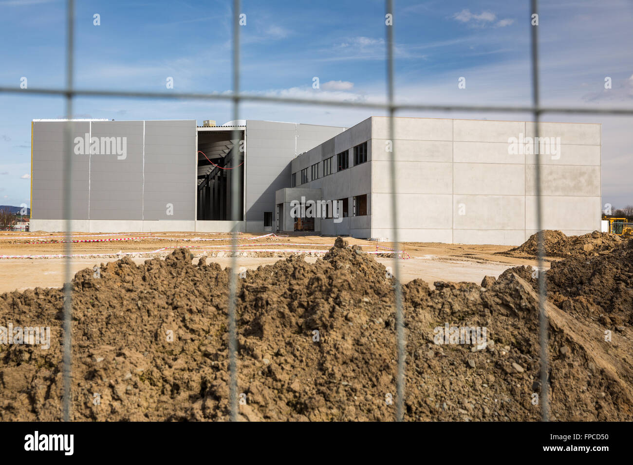 Construction site with a fence around it Stock Photo - Alamy