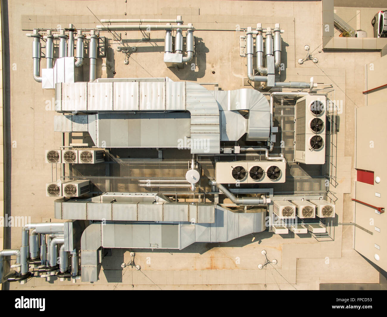 Air conditioning equipment atop a modern building - aerial/drone view of  the roof with all the necessary installations Stock Photo - Alamy