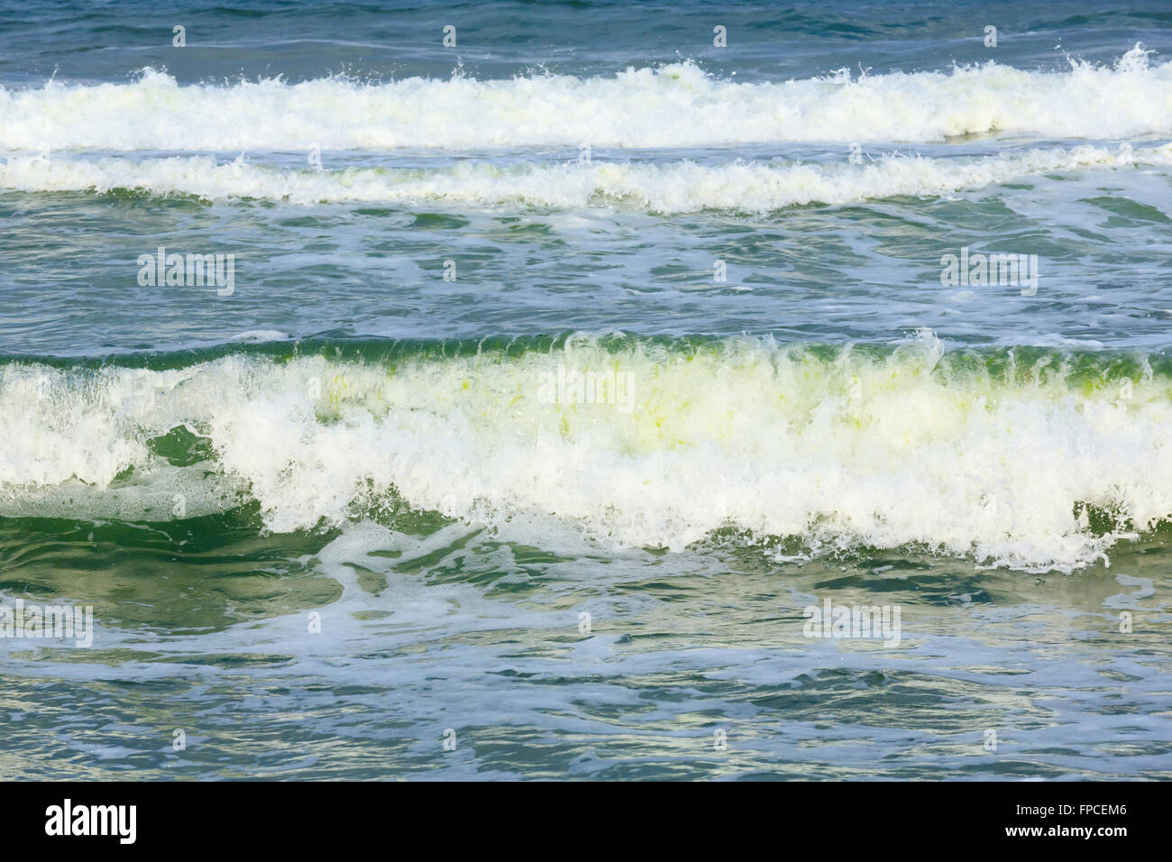Sea surf waves with foam caps. Nature background. Stock Photo