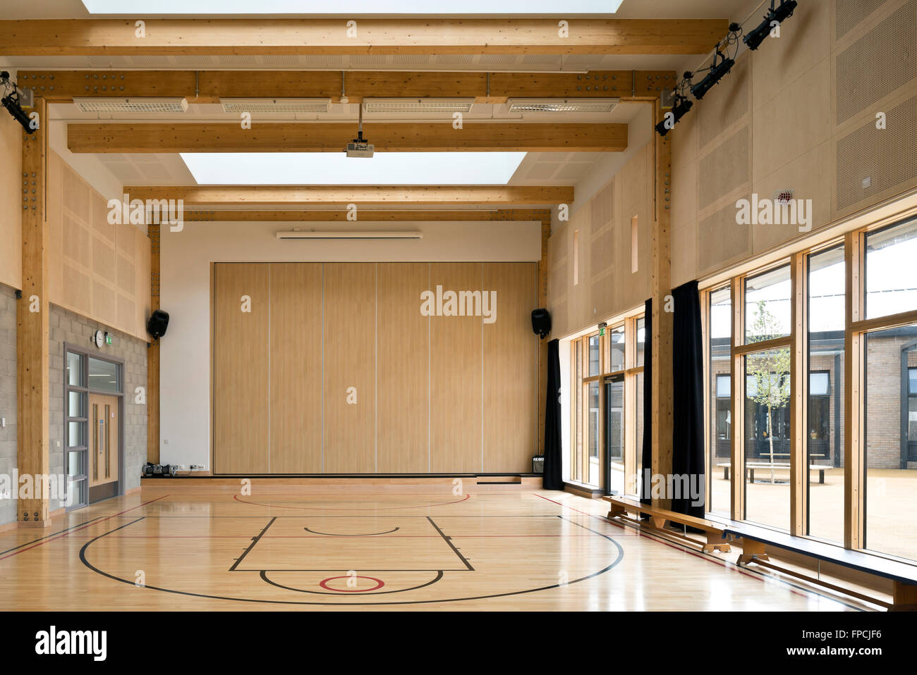 An empty gymnasium inside Port Glasgow Shared Campus school, designed by Archial Norr Architects. Stock Photo