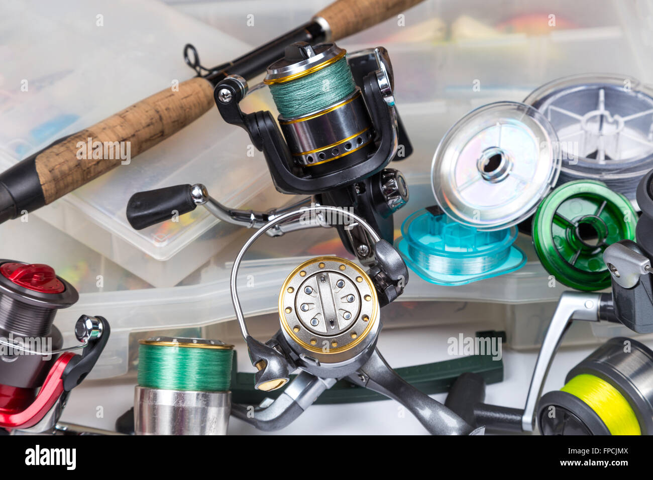 Different fishing tackles composition in storage box. Concept design
