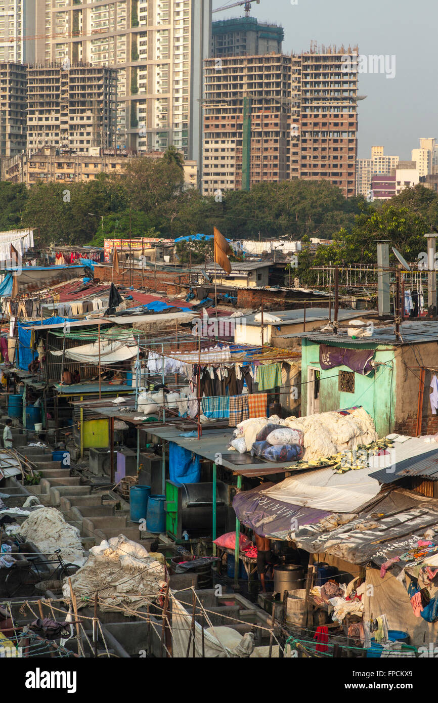 A View of the city of Mumbai, showing the poverty and poor housing and the Mahalaxmi Dhobi Ghat, open air laundromat. Stock Photo