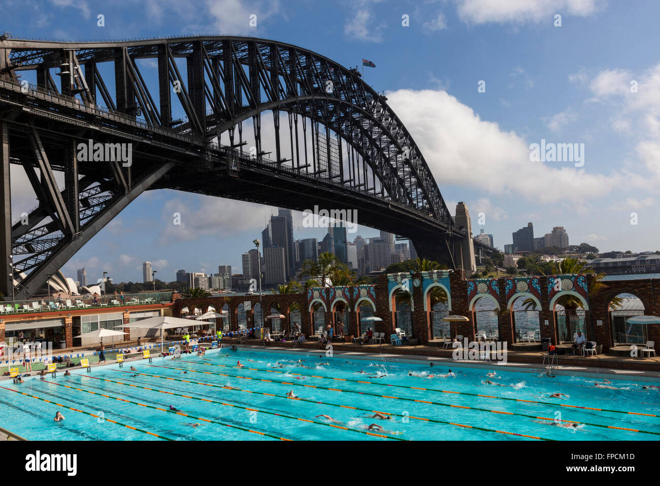 A view of the bridge in Sydney taken from the Sydney Olympic swimming pool. Stock Photo
