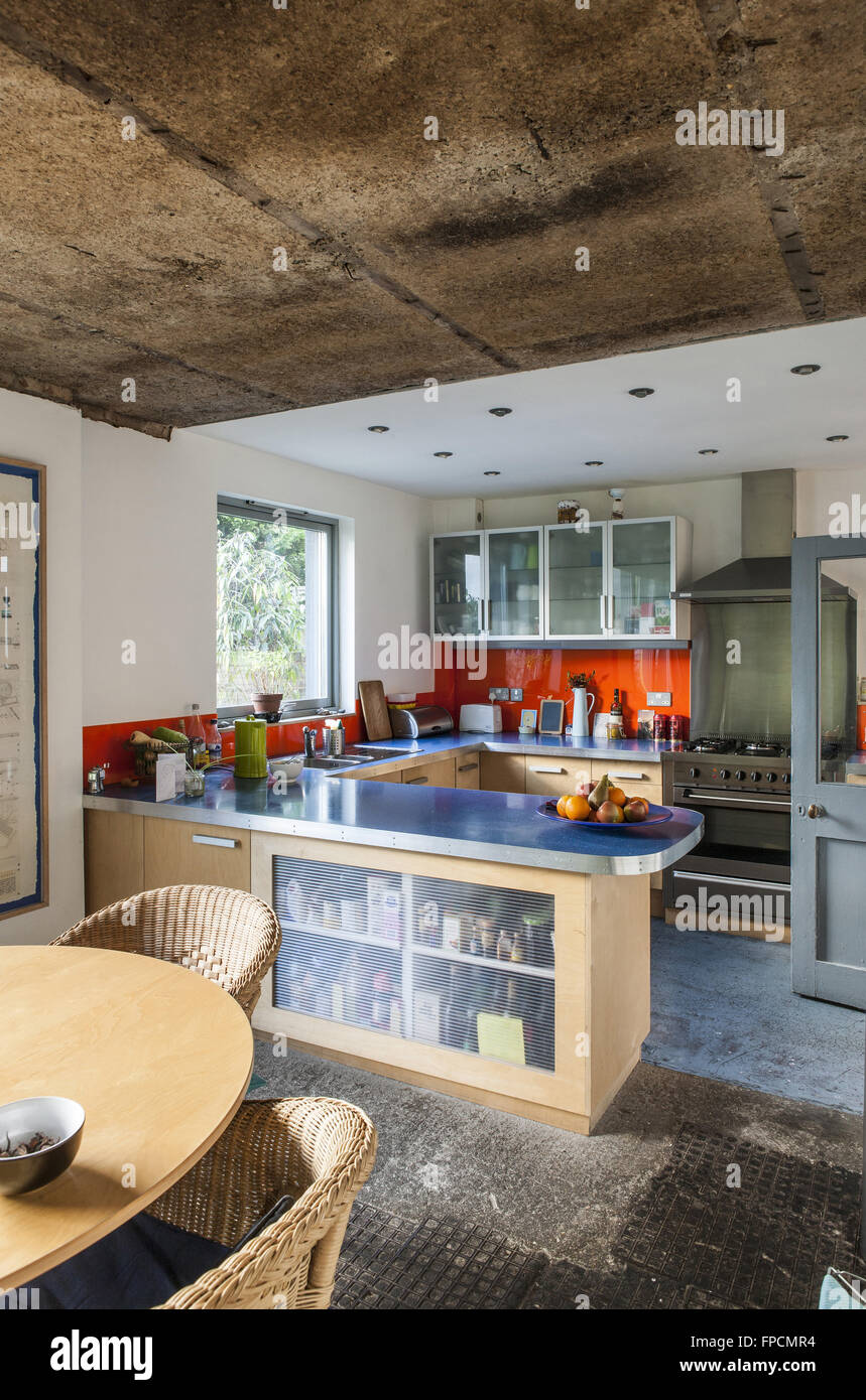 An interior view of a residential property showing the modern kitchen and dining area, made from an old milk depot, in Peckham. Stock Photo