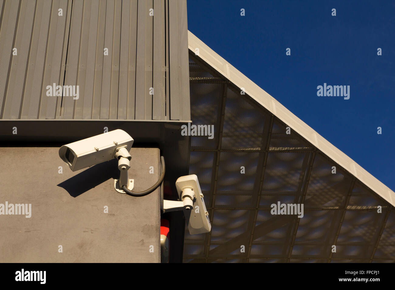 Security camera in a modern building, for video surveillance Stock Photo