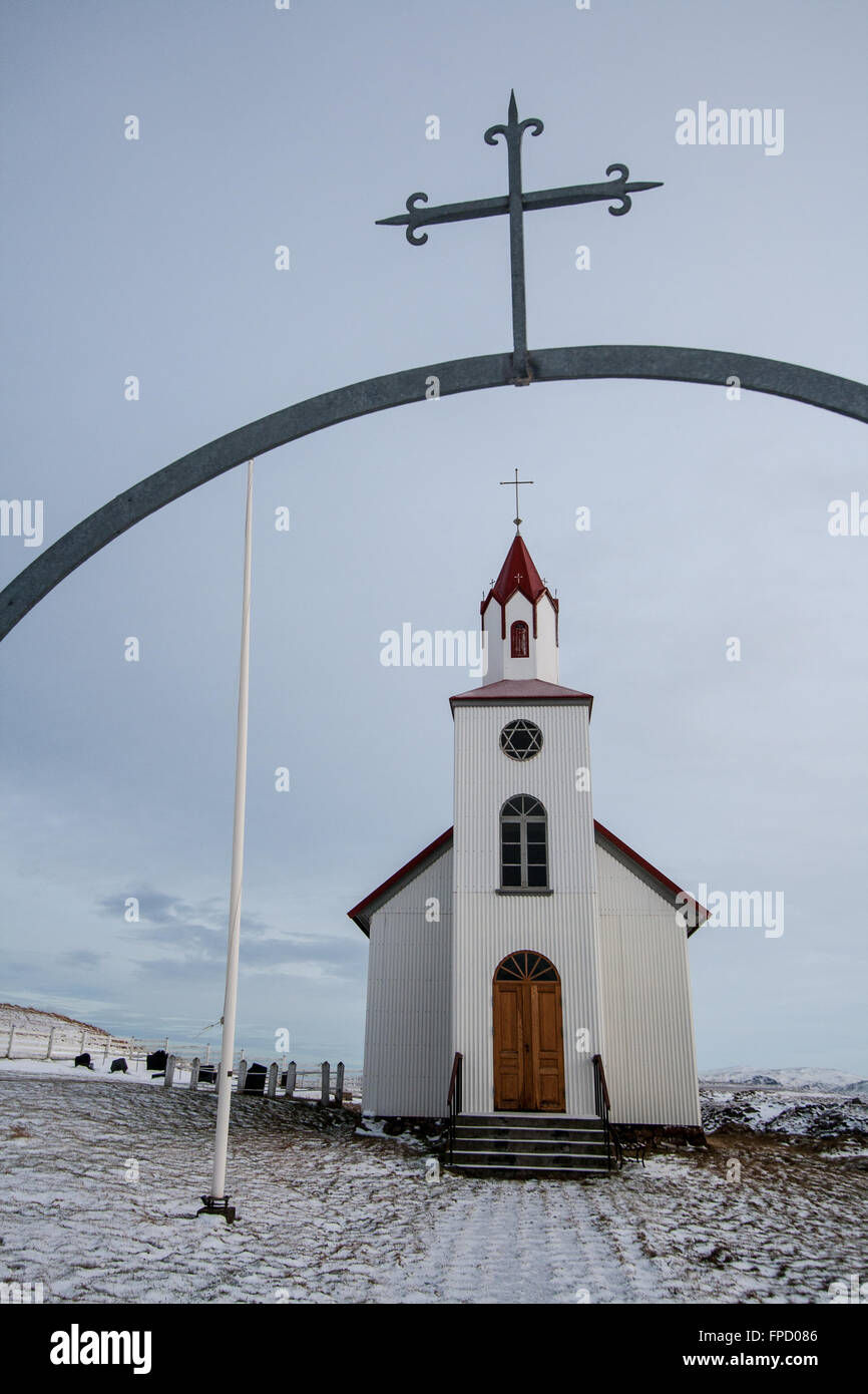 View through the gateway of church at Helgafell, Sngaefellsnes, Iceland in winter Stock Photo