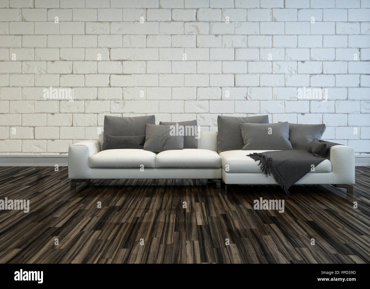 Rustic Living Room Interior With A Large White Sofa With Grey Cushions On A Bare Wooden Parquet Floor Against A White Painted Rough Brick Wall Stock Photo Alamy