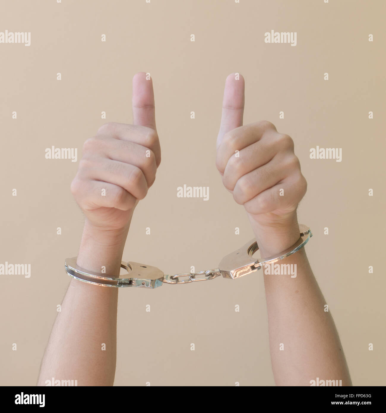 hand in shackle Stock Photo