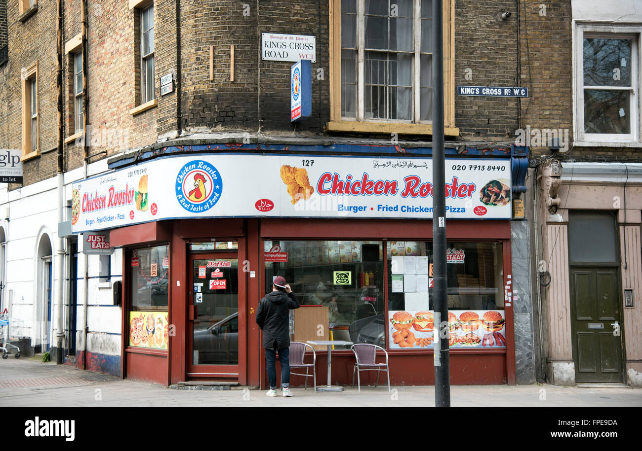 Chicken Rooster fried food shop King's Cross Road Stock Photo Alamy