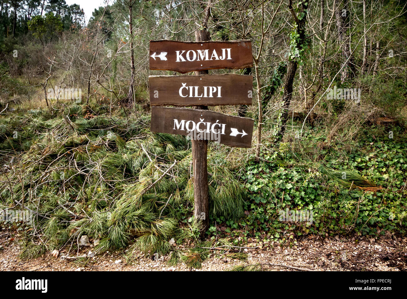 Direction sign on a hiking trail through the woods, near Dubrovnik, Croatia. Stock Photo