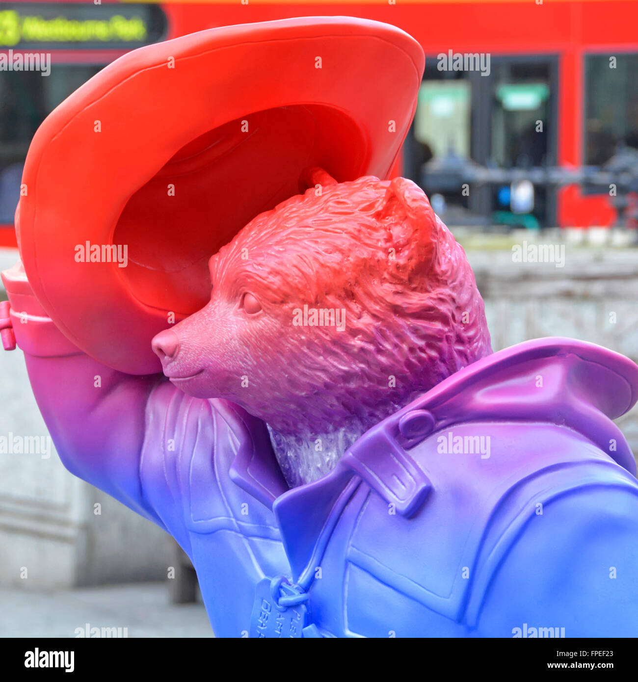Paddington Bear statue a fictional character in children's literature titled 'R; G; B' designed by Zaha Hadid and on display in central London UK Stock Photo