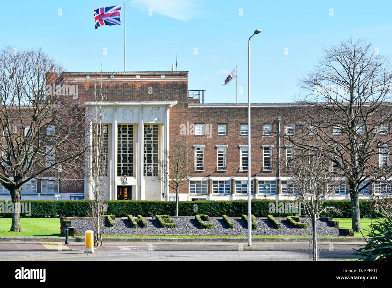 Dagenham Civic Centre with The Civic sign formed in low growing clipped foliage creating letters now part of London Borough Barking & Dagenham UK Stock Photo