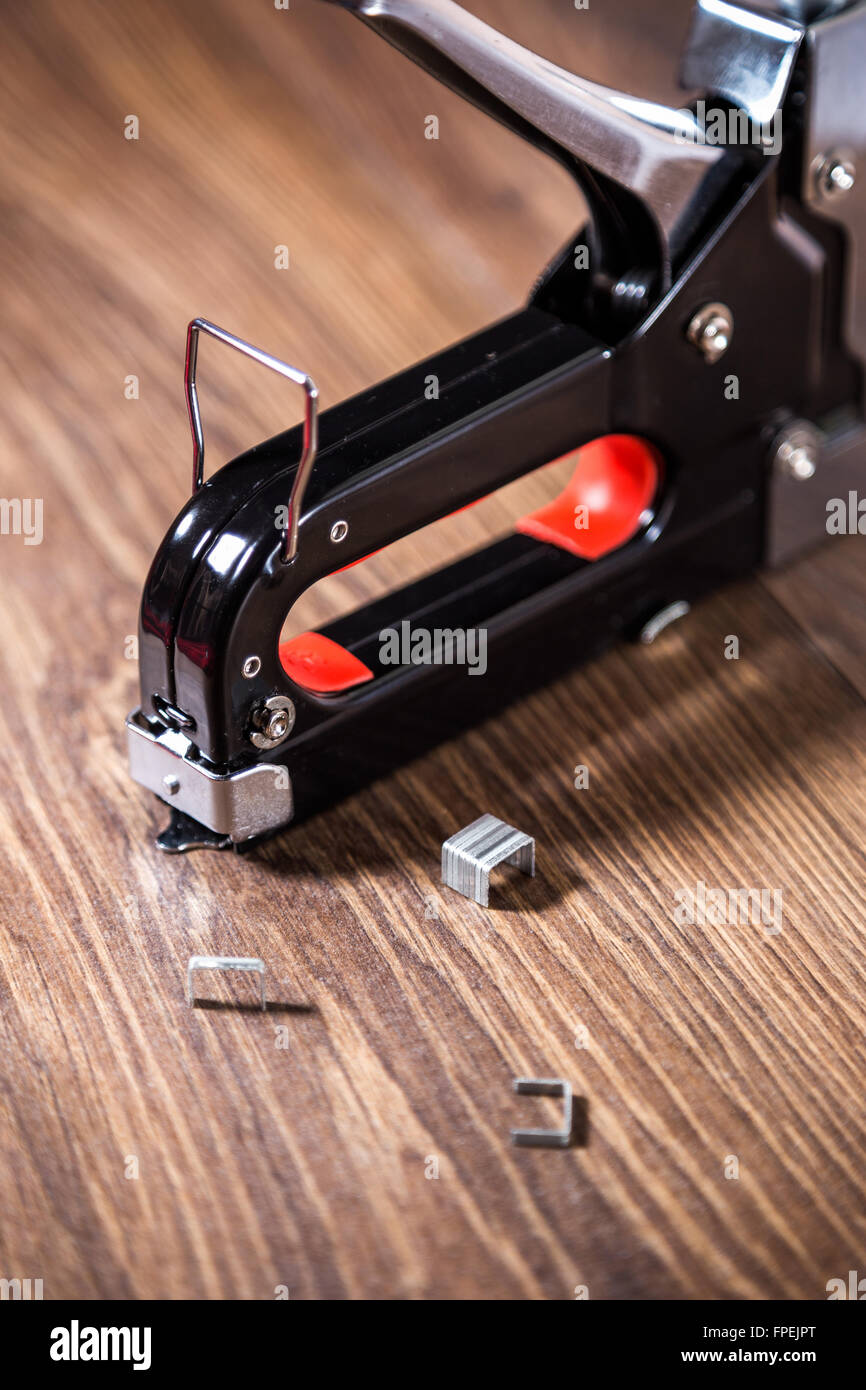 Stapler and staples for carpenters Stock Photo