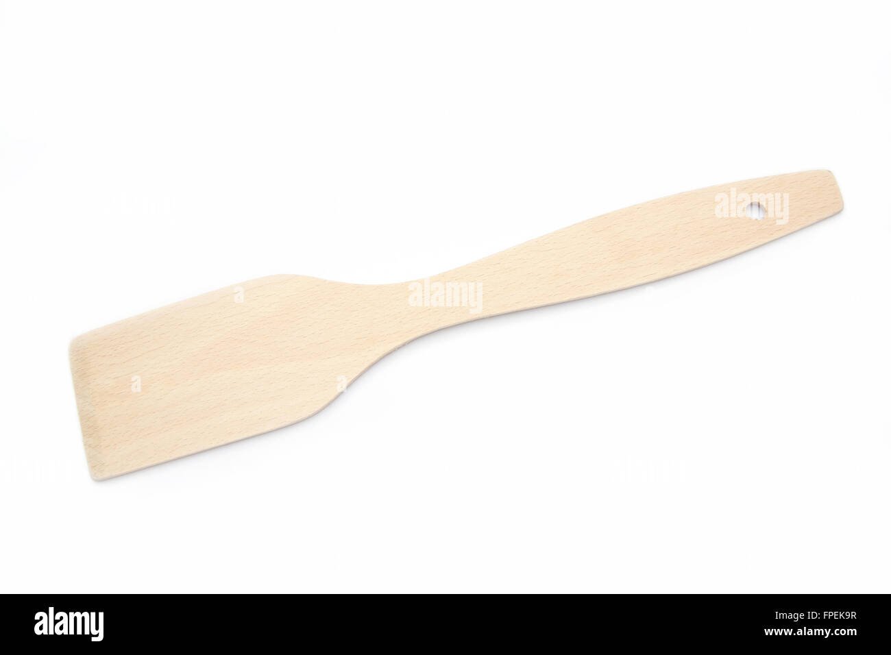Wooden spatula on a white background Stock Photo
