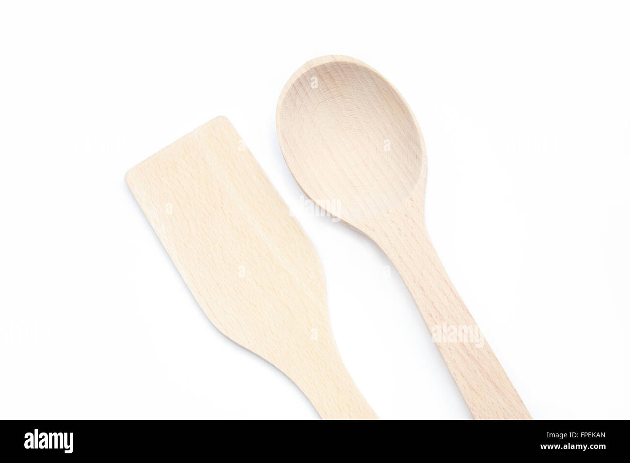Wooden spoon and spatula on a white background Stock Photo Alamy