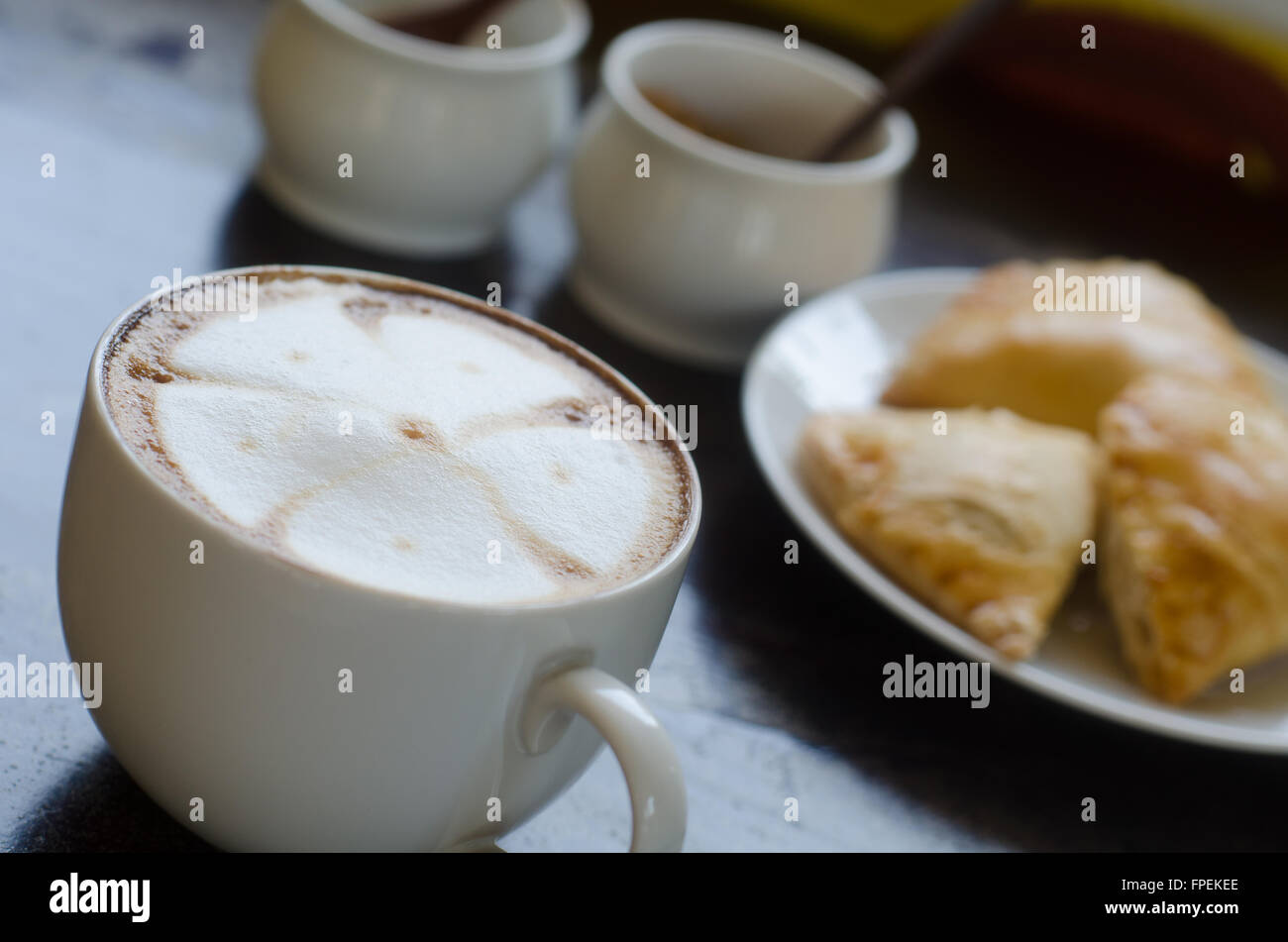 A cup of hot coffee and curry puff Stock Photo Alamy