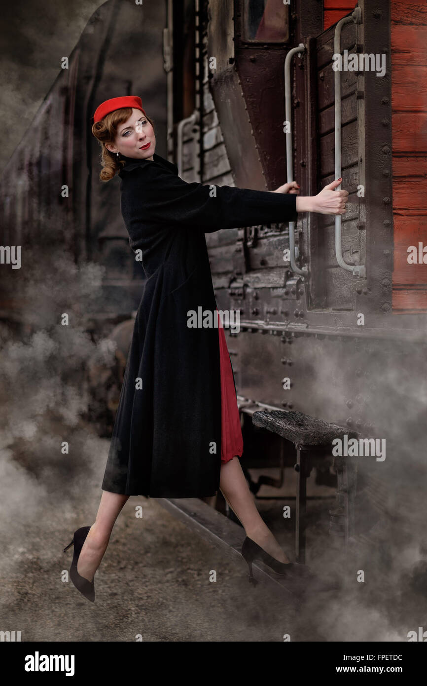 Woman and steam train hi-res stock photography and images - Alamy