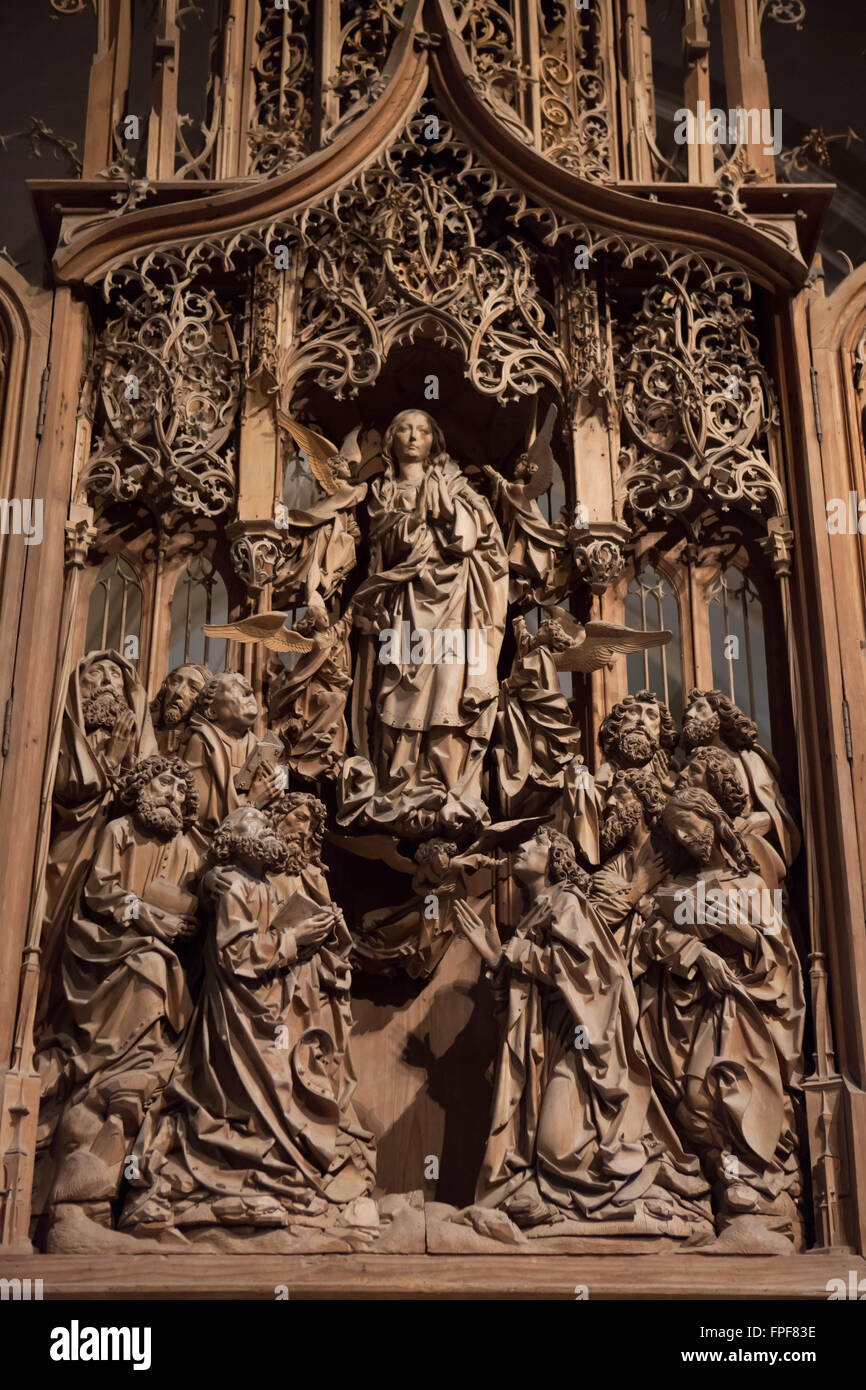 Assumption of the Virgin Mary. Central panel of the Virgin Mary Altarpiece by German sculptor Tilman Riemenschneider in the Herrgottskirche Church near Creglingen, Baden-Wurttemberg, Germany. Stock Photo