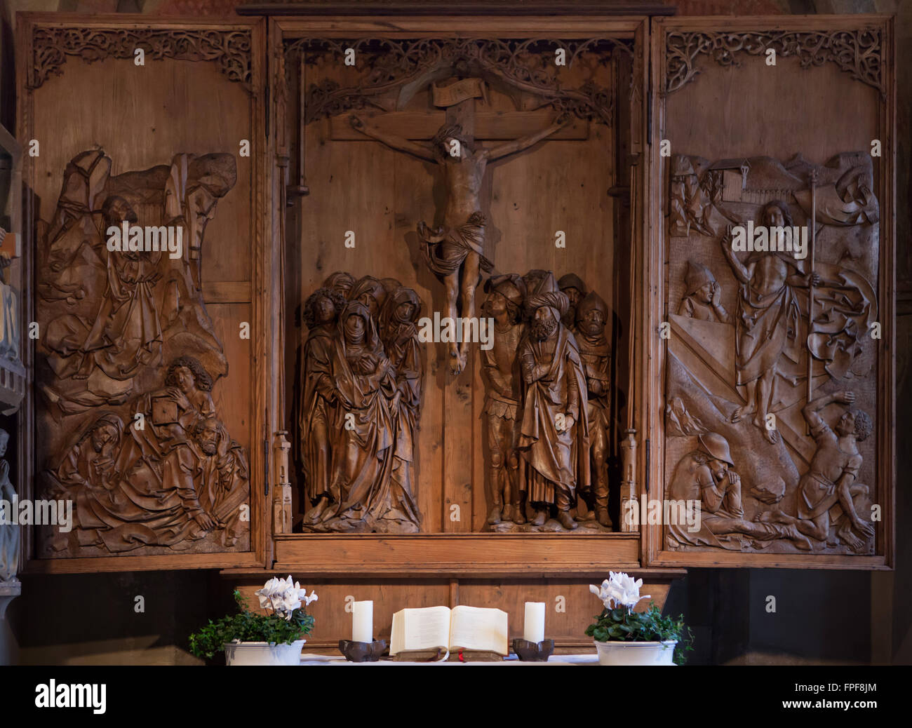 Crucifixion Altarpiece (1508) by German sculptor Tilman Riemenschneider in Peter-und-Paul Kirche in Detwang near Rothenburg ob der Tauber, Middle Franconia, Bavaria, Germany. Stock Photo