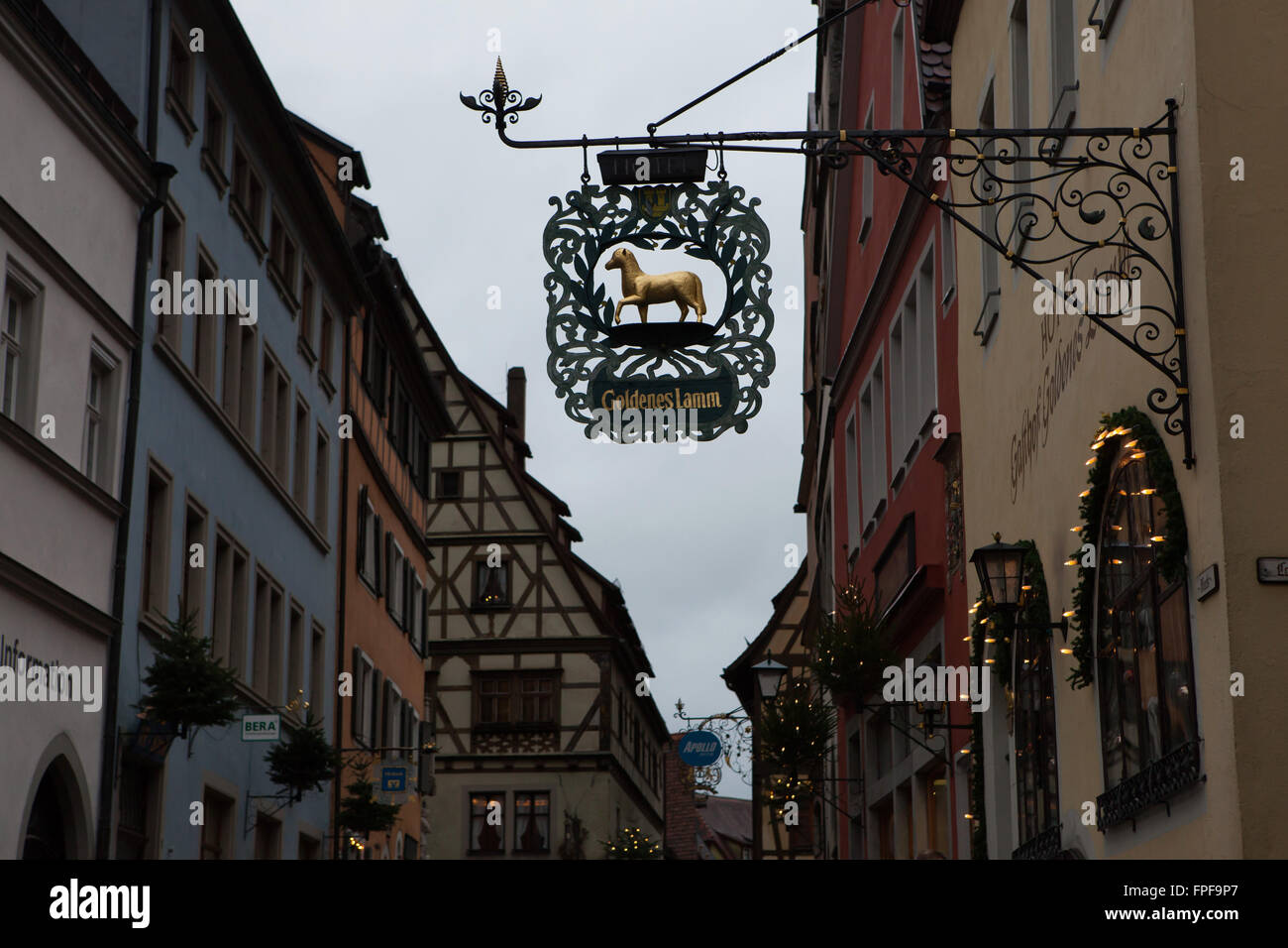 Traditional medieval sign of the Goldenes Lamm Hotel (Golden Lamb Hotel) in Rothenburg ob der Tauber, Middle Franconia, Bavaria, Germany. Stock Photo