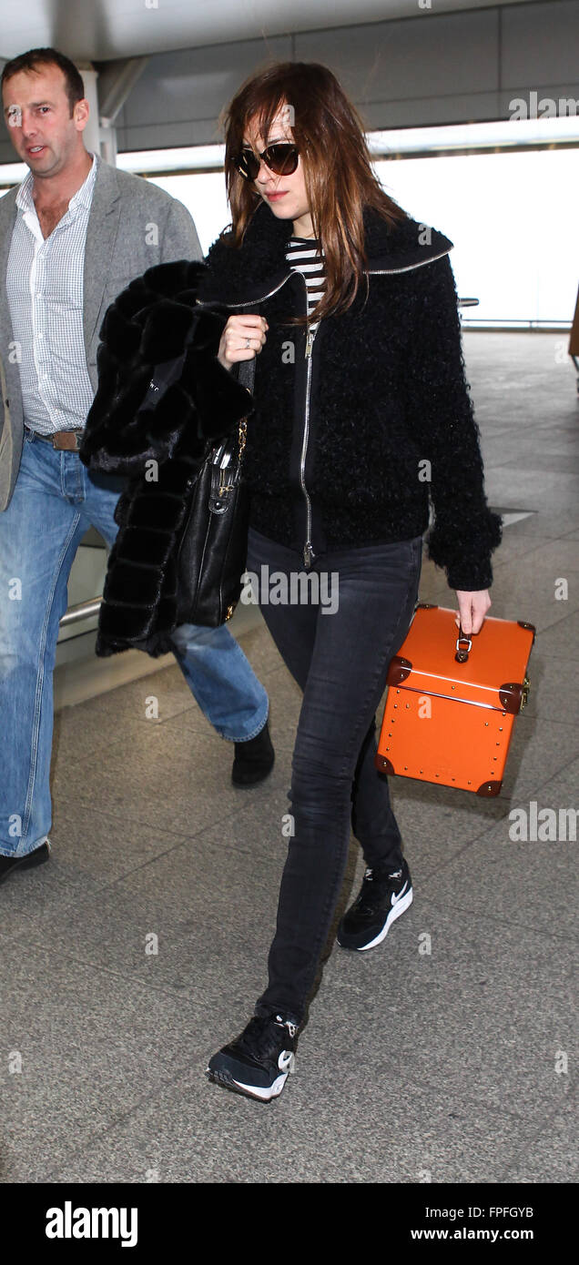 Dakota Johnson arrives at Heathrow Airport to catch a flight  Featuring: Dakota Johnson Where: London, United Kingdom When: 15 Feb 2016 Stock Photo