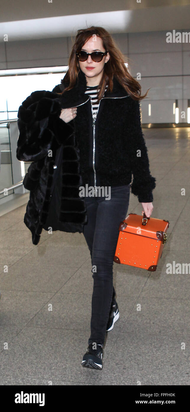 Dakota Johnson arrives at Heathrow Airport to catch a flight  Featuring: Dakota Johnson Where: London, United Kingdom When: 15 Feb 2016 Stock Photo