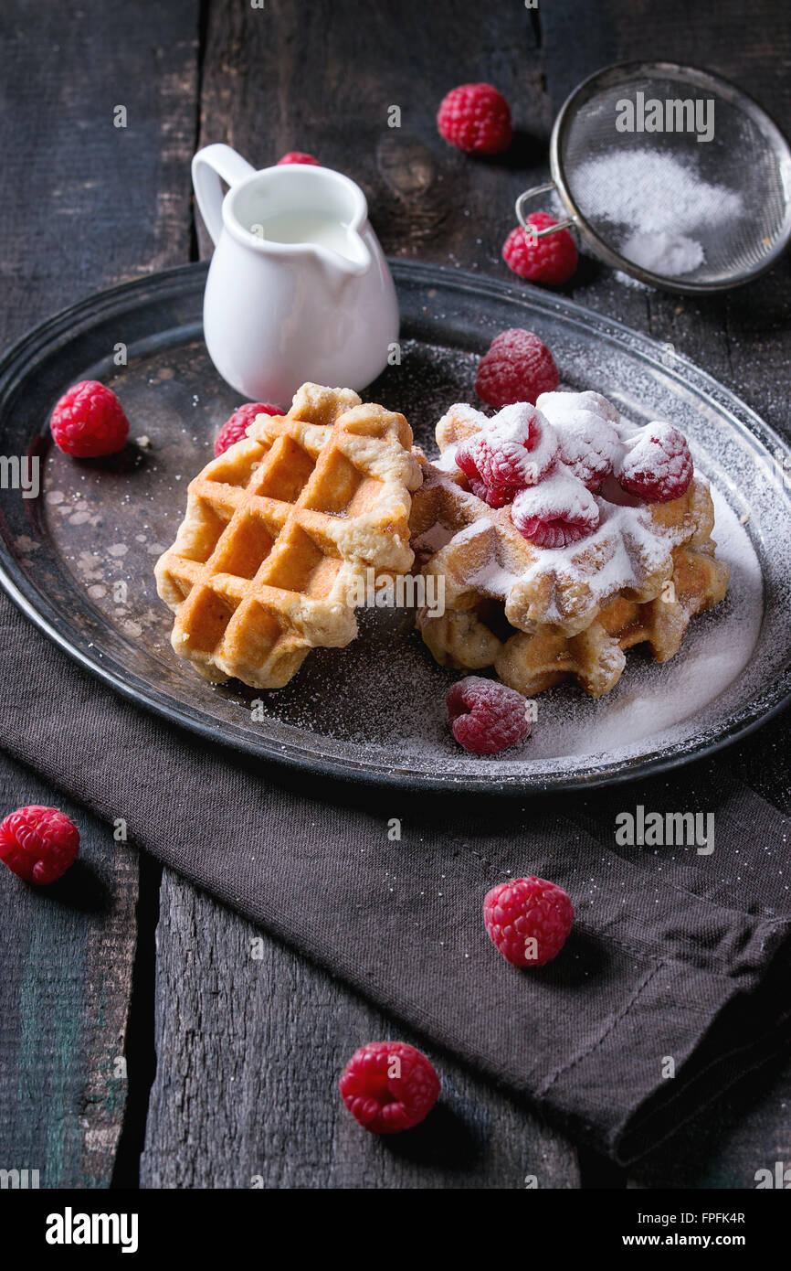 Belgian waffles with raspberries Stock Photo - Alamy