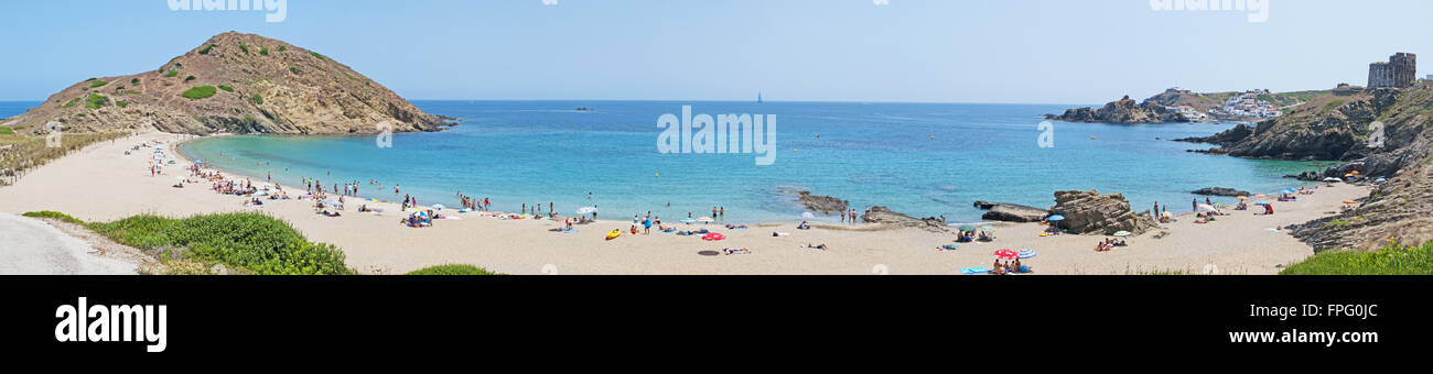 Menorca, Balearic Islands, Spain, Europe: panoramic view of the beach of Cala Mesquida with the watchtower Punta de sa Torre Stock Photo