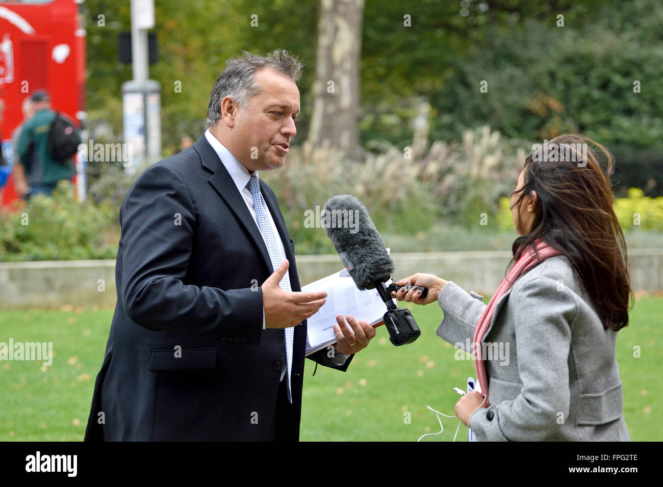David Warburton MP (Conservative: Somerton and Frome) being interviewed on College Green, Westminster Stock Photo