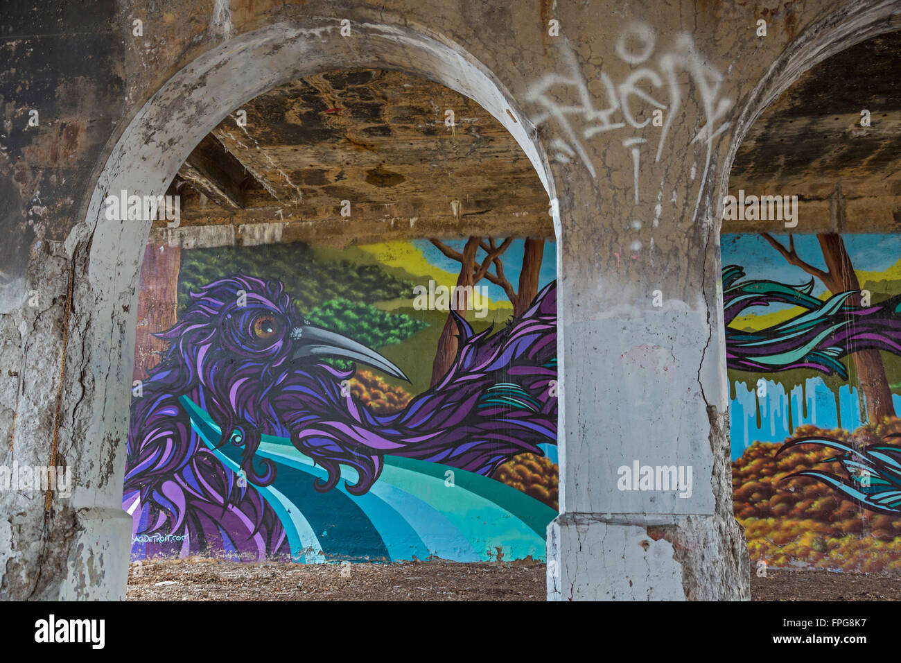 Detroit, Michigan - A painting called 'Nature's Wrath' by Malt under a decaying bridge on the Dequindre Cut Greenway. Stock Photo