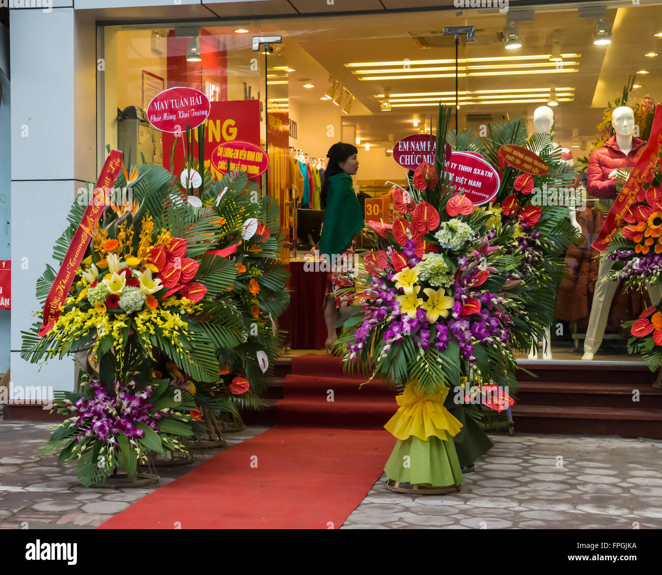 SAIGON, VIETNAM - JANUARY 21, 2016: A shop preparing for Tet, the Vietnamese New Year which takes place on February 8th which is Stock Photo