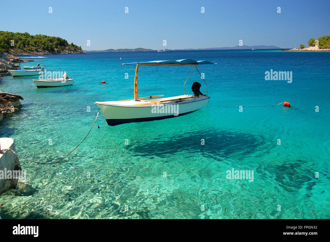 Picturesque scene of boats in a quiet bay of Milna on Brac island, Croatia Stock Photo