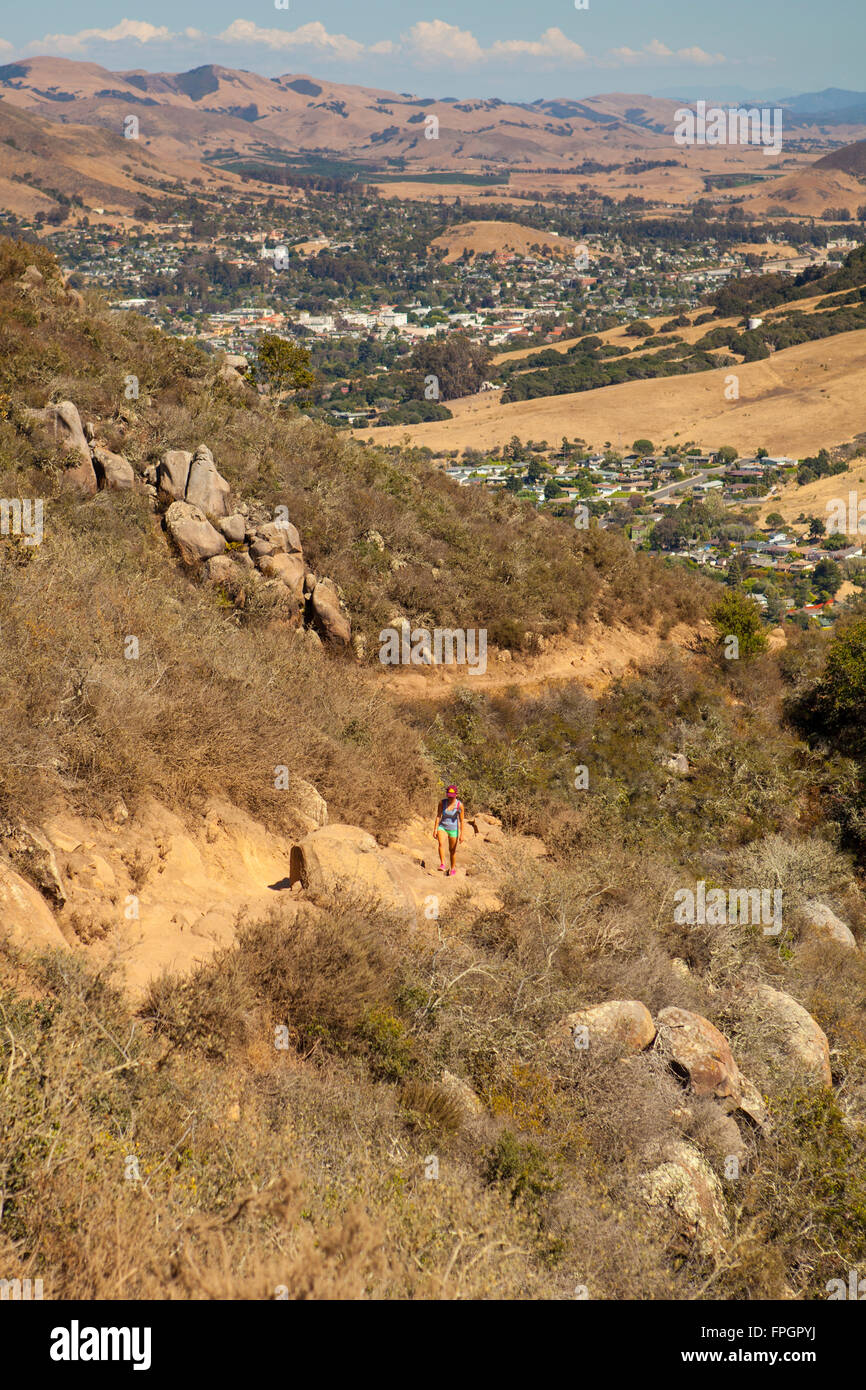 hiker and view of San Luis Obispo from Bishop Peak, San Luis Obispo, California Stock Photo