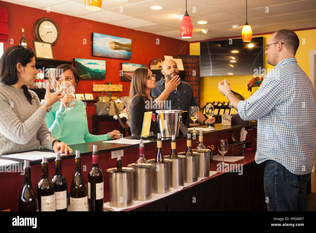 guests enjoy wine tasting at Moonstone Cellars, Cambria, California Stock Photo
