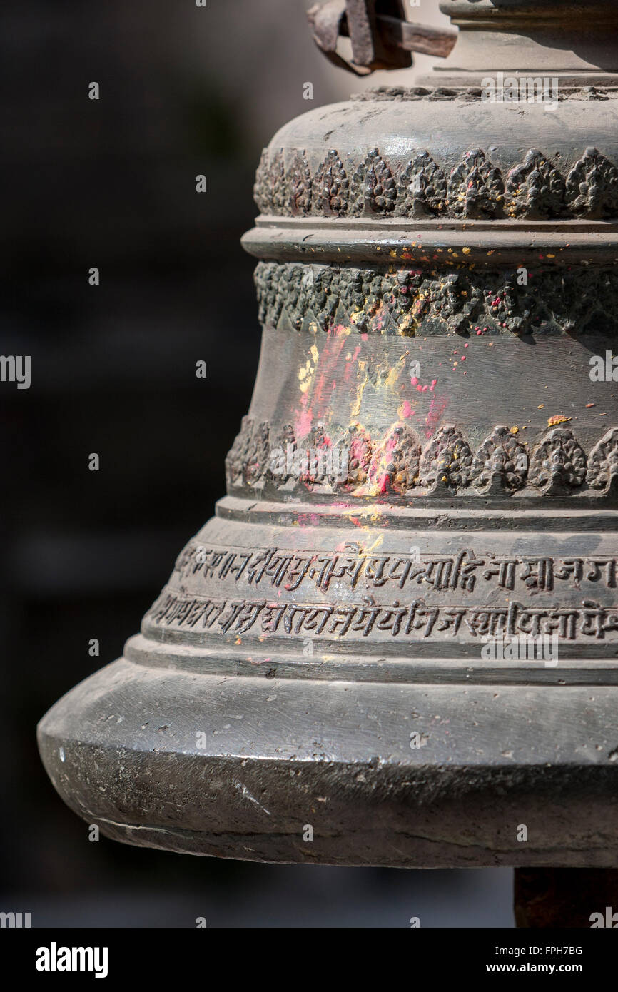 Nepal, Patan.  Hindu Temple Bell, with Traces of Kumkuma Powder. Stock Photo