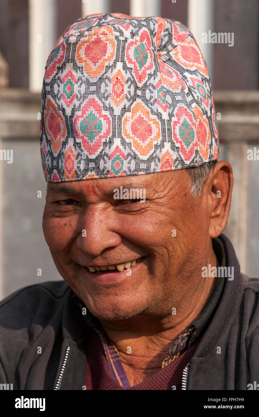 Nepal, Patan.  Nepalese Man Wearing Traditional Hat, a Dhaka Topi, a Tika on his Forehead. Stock Photo