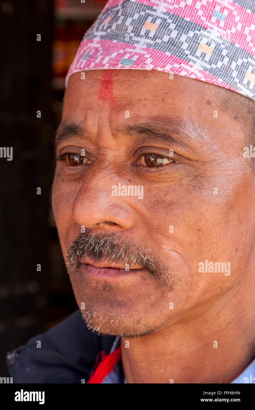 Nepal, Patan.  Nepalese Man Wearing a Nepali Hat (Dhaka Topi). Stock Photo