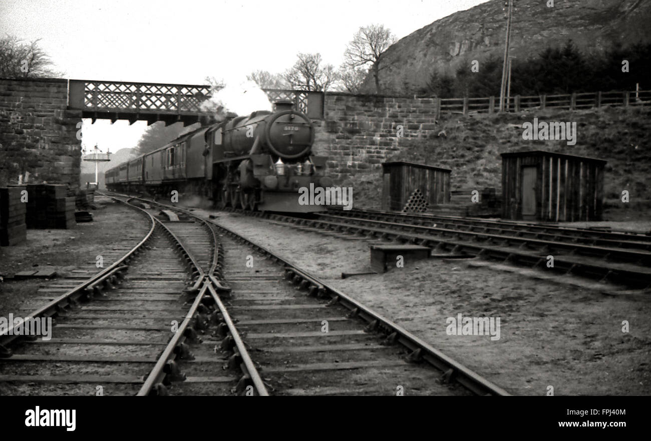 LMS Black Five 4-6-0 steam locomotive 5170 leaves Blair Atholl with a train Stock Photo