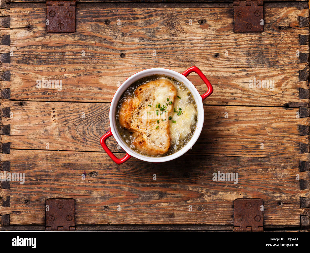 Onion soup with dried bread and cheddar cheese Stock Photo